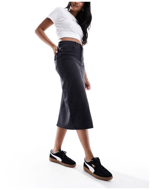Jupe longueur mollet en jean fendue devant - délavé Vero Moda en coloris Black