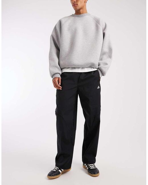 Adidas Originals Black F50 Loose Striped Track Pants for men