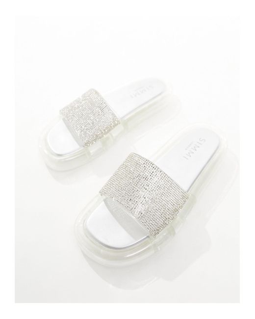 Sandalias plateadas planas con exterior adornado fan SIMMI de color White