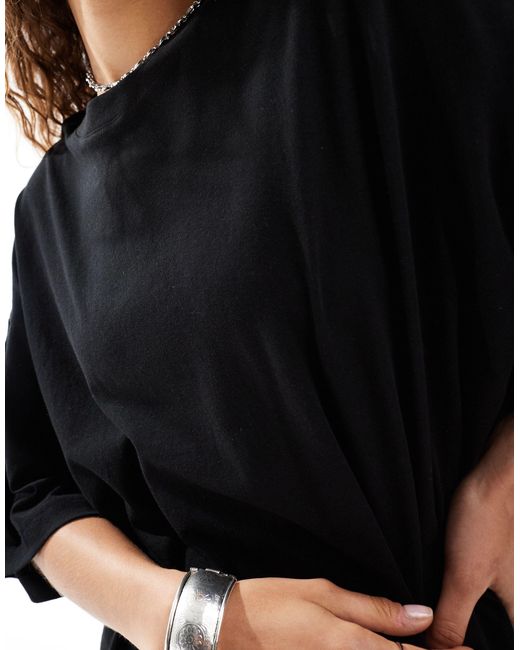 Huge - robe t-shirt courte - - exclusivité asos Weekday en coloris Black