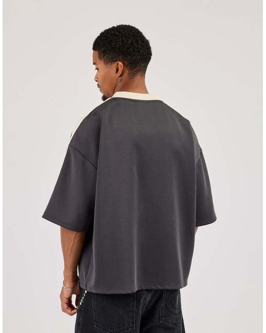 CERNUCCI Black Oversized Football Top for men