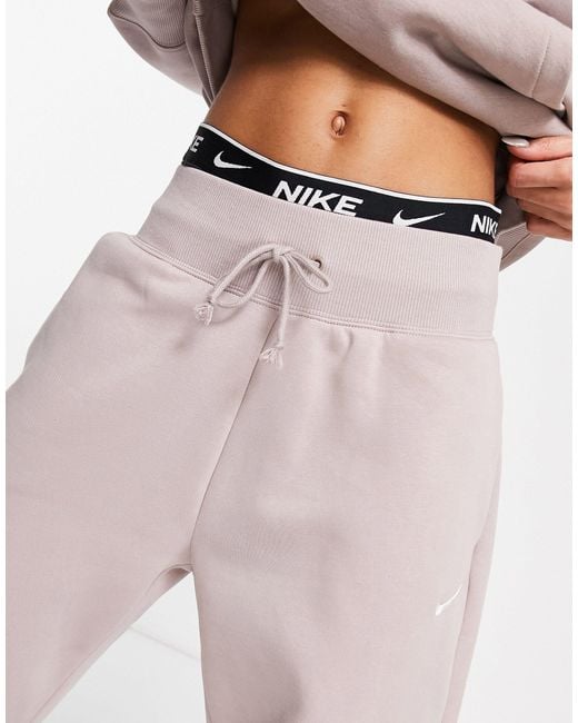 Nike Mini Swoosh Oversized joggers in White