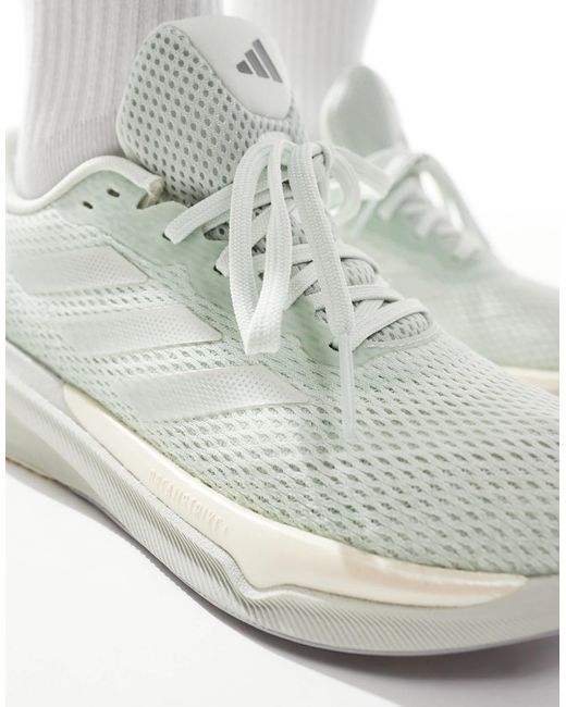 Adidas Originals White Adidas running – supernova stride – sneaker