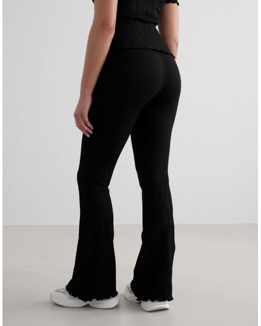 Mallas Negras De Corte Acampanado Tulip De Aim'n de color Black