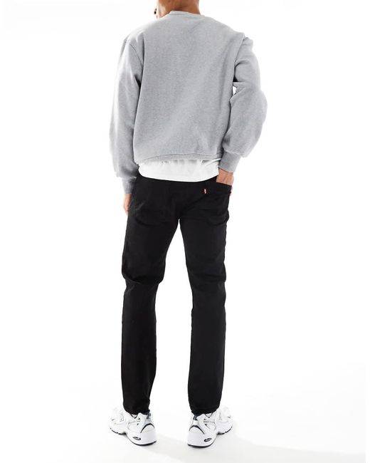 Vaqueros Negros De Corte Tapered 502 De Levi's de hombre de color White