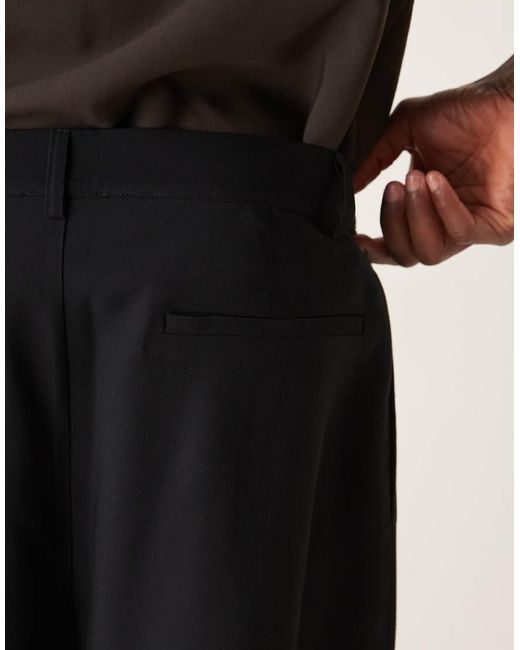 ASOS Nette Ruimvallende Broek in het Black voor heren