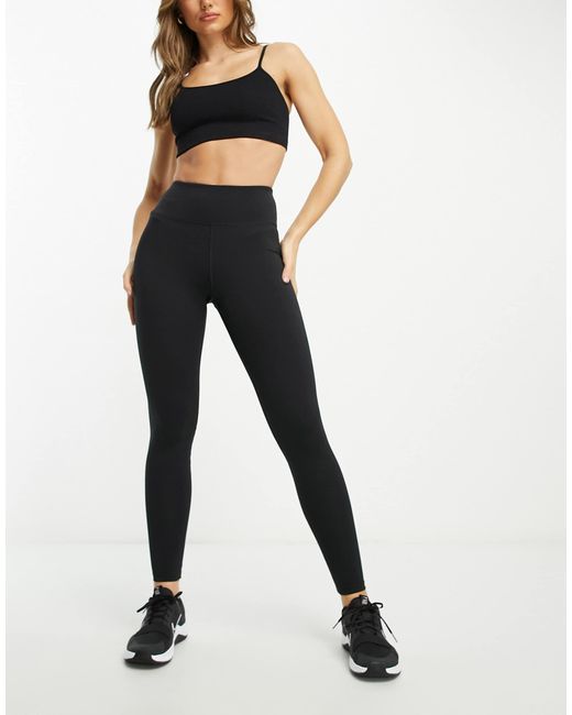 Essential - legging HIIT en coloris Black