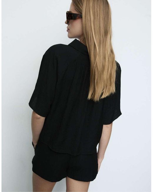 Stradivarius Black Button-Up Flowing Shirt
