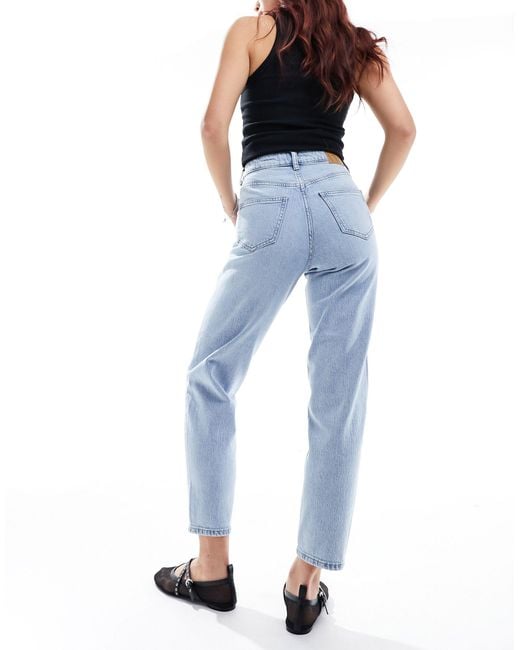 Tessa - mom jeans lavaggio chiaro a vita alta di Vero Moda in Blue