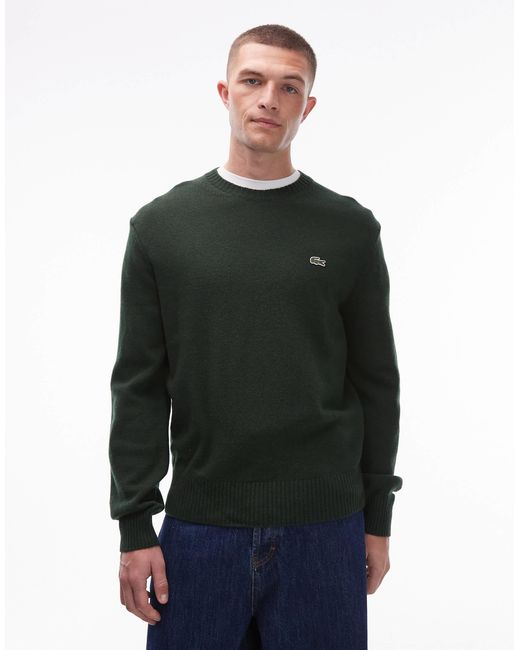 Pull ras Lacoste pour homme en coloris Black