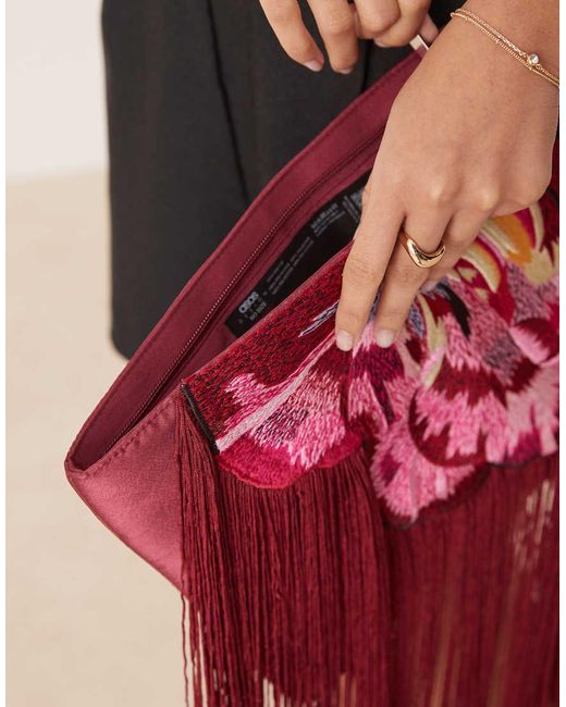 ASOS Embroidered Flower Zip Top Clutch With Tassel Detail
