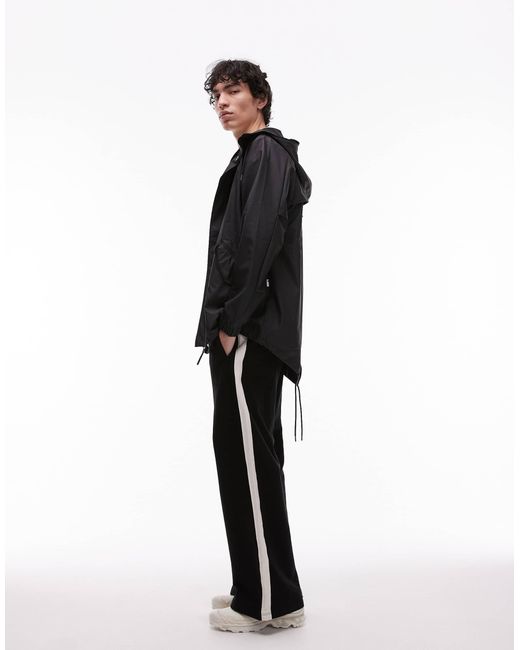 18010 - veste imperméable à ourlet plongeant Rains pour homme en coloris Black