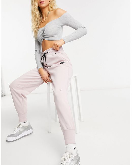 Nike Tech Fleece joggers in Pink