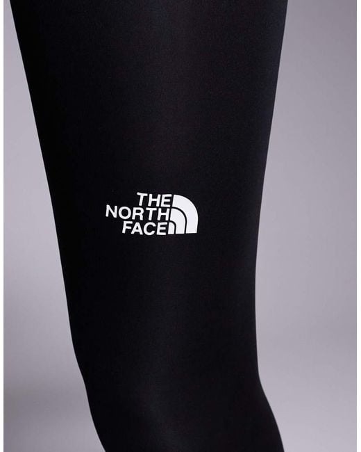 Leggings Capri Deportivos Negros Con Logo Flex De Training The North Face de color Blue