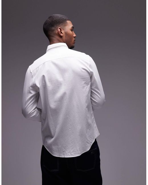 Tommy Hilfiger – flex – schmal geschnittenes hemd aus dobby-stoff in Multicolor für Herren