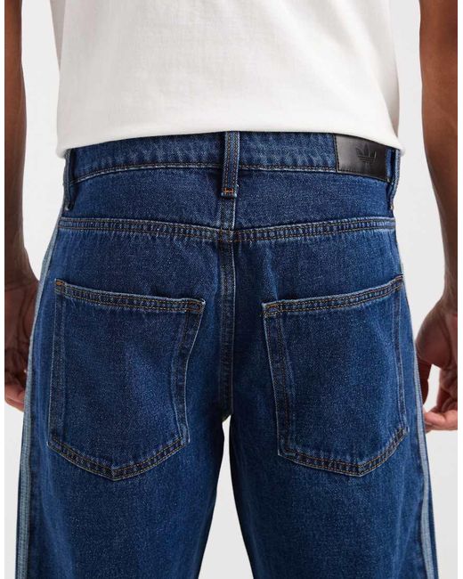 Adidas Originals Blue Firebird Loose Fit Jeans for men