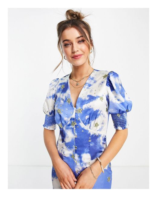 blue dress with gold stars