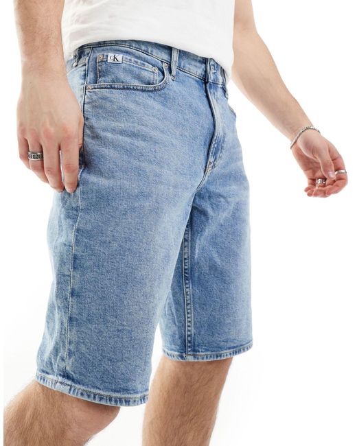Pantaloncini di jeans regular lavaggio chiaro di Calvin Klein in Blue da Uomo