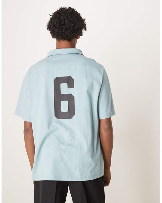 Polo Azul Claro De Corte Cuadrado Extragrande Con Estampado Gráfico Deportivo De ASOS de hombre de color Blue
