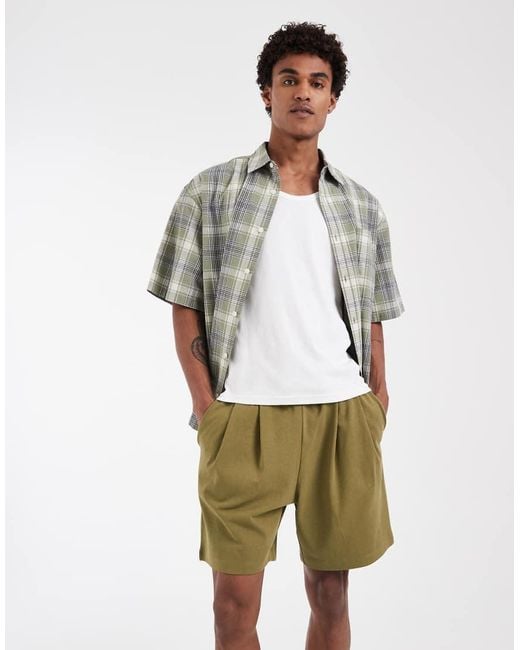 ASOS Green Circular Design Collection Pleated Oversized Jersey Shorts for men