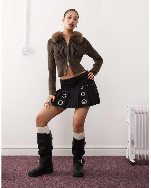 Minga Black London Pleated Low Rise Mini Skirt With Eyelets