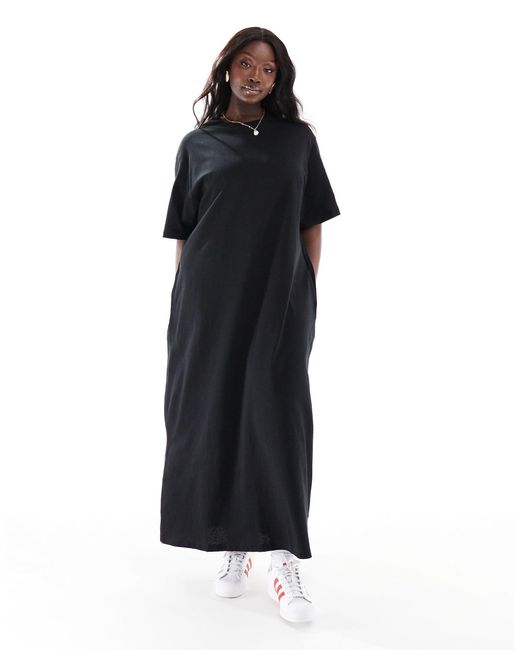 Curve - robe t-shirt longue à poches ASOS en coloris Black