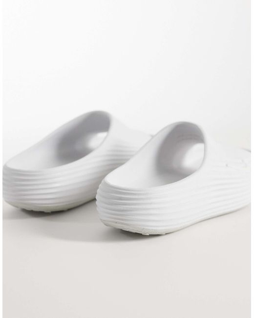 Reactx - claquettes Nike pour homme en coloris White