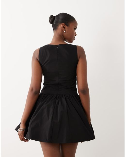 The Frolic Black Exclusive Bengaline Tie Front Detail Skater Mini Dress