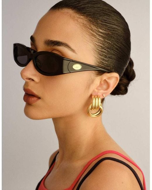 Glaciem di Le Specs in Brown