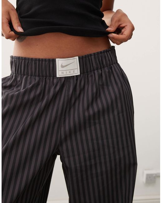Nike Gray – gestreifte popeline-hose