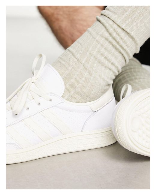 Adidas originals handball spzl deals trainers black with gum sole