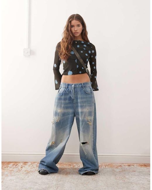 Reclaimed Vintage Blue Slash Neck Flare Sleeve Top With Spliced Blurred Polka Dot Print