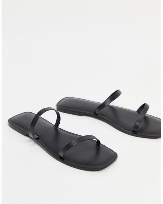 black strappy slides