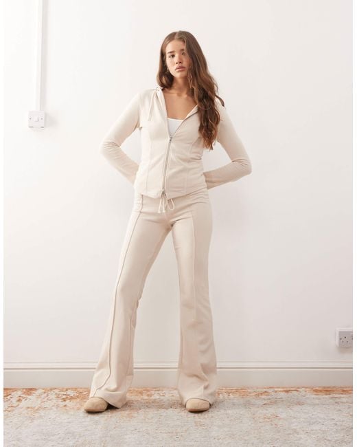 Sweat à capuche ajusté d'ensemble à manches évasées - beige Monki en coloris Natural