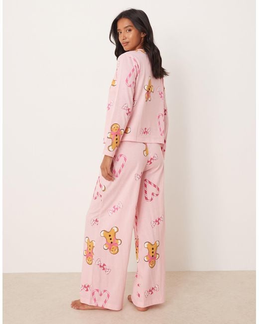ASOS Pink Asos Design Petite Gingerbread & Candy Cane Long Sleeve Top & Trouser Pyjama Set