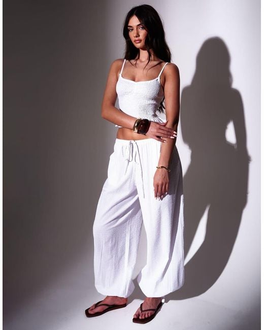 South Beach White Seersucker Smocked Peplum Top