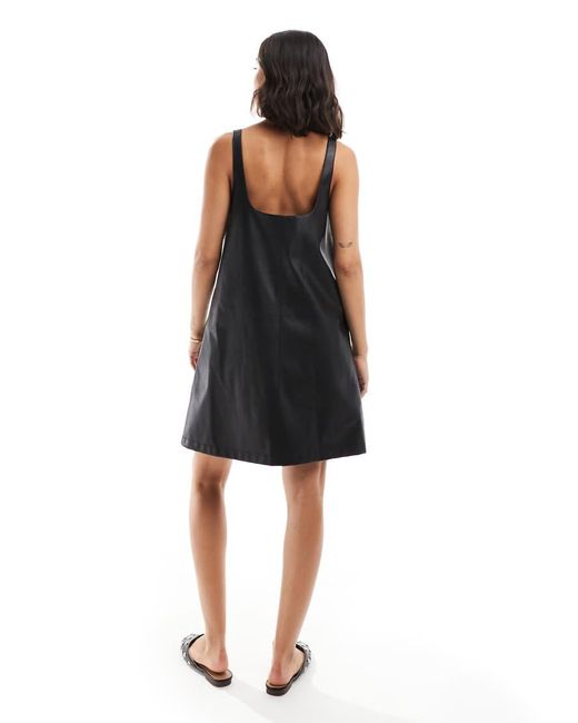 slim fit dress slacks Girls Ruffle Sleeve Faux Leather Pinafore Dress in Black