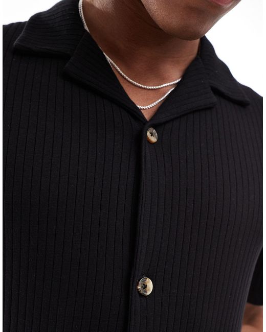 ASOS – locker geschnittenes, geripptes polohemd in Black für Herren
