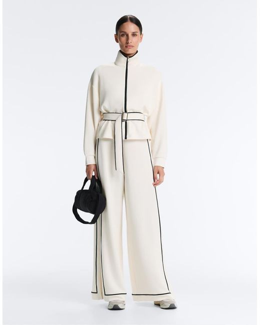 Oysho White Soft-touch Modal Wide-leg Trousers With Contrast Piping