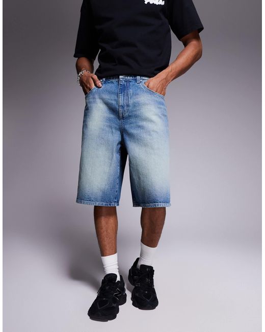 Bermuda long en jean style charpentier - moyen délavé ASOS pour homme en coloris Blue
