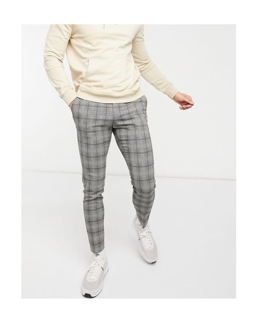 Herren Kleidung Hosen Hosen mit enger Passform H&M Hosen mit enger Passform Graue Stoffhose 