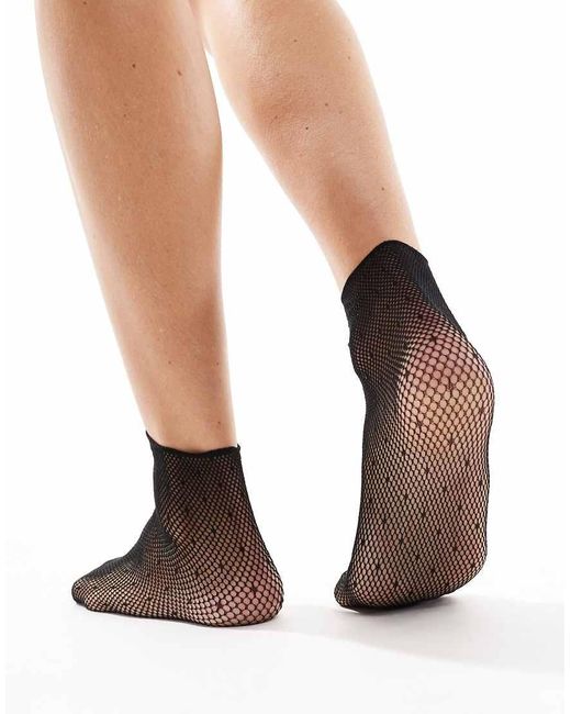 Calcetines Negros Con Patrón De Lunares Muy Pequeños De Rejilla Transparente De Pretty Polly de color Brown