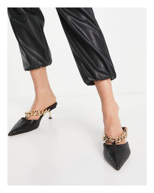 Mules negras con tacón mediano y detalle ASOS de color Negro | Lyst