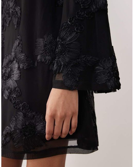 Gina Tricot Black Long Wide Sleeve Sleeve Flowy Mini Dress With Open Back