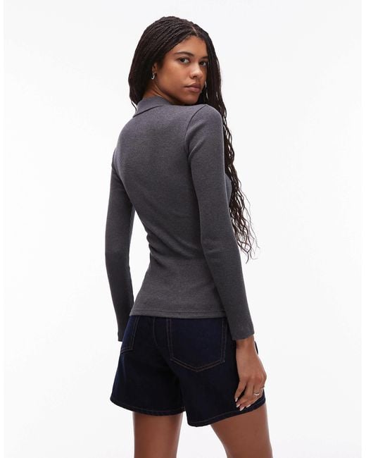 Lacoste Blue – geripptes, langärmliges polohemd