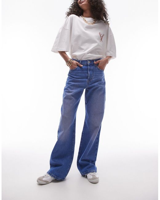 Jeans a colonna a vita medio alta medio acceso di TOPSHOP in Blue