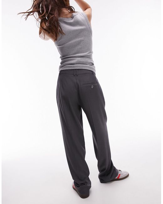 Pantaloni a vita bassa grigi di TOPSHOP in Gray