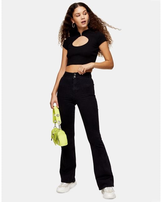 TOPSHOP Skinny Stretch Flare Jeans in Black | Lyst