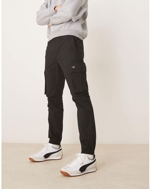 Calvin Klein – cargohose mit engem schnitt in Natural für Herren