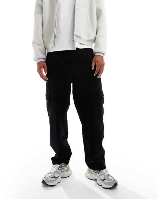 ASOS – schmal zu laufende relaxed fit cargohose in Black für Herren